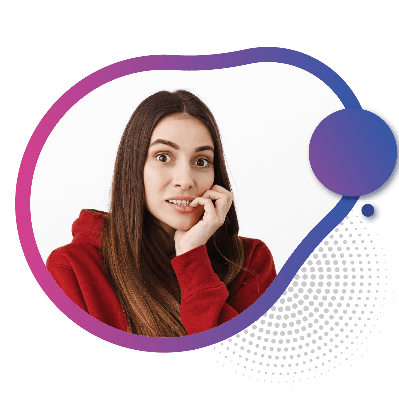 A woman with long brown hair wears a red hoodie, resting her chin on her hand, symbolizing the dependable and uninterrupted connection provided by eSIM technology in Australia